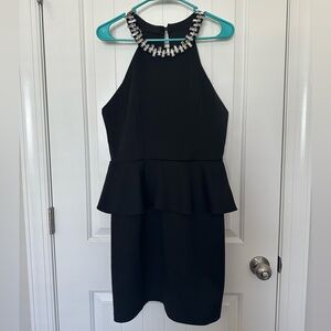 Bisou Bisou Black Peplum Dress with Embellished Neckline